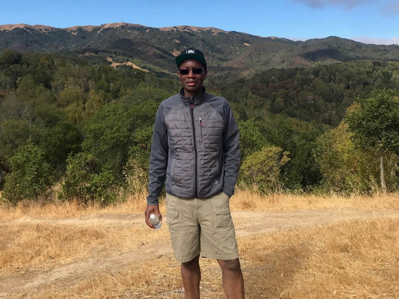 Dr. Bruce Ovbiagele on a hike at Mount Burdell in Marin County, California. "I love doing things in nature," he said. "And hiking, I think more than anything else, has been a way to be more physically active and also to just unplug." (Photo courtesy of Dr. Bruce Ovbiagele)