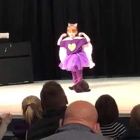 Kindergartener Alyiah performs "Fight Song" during her school talent show