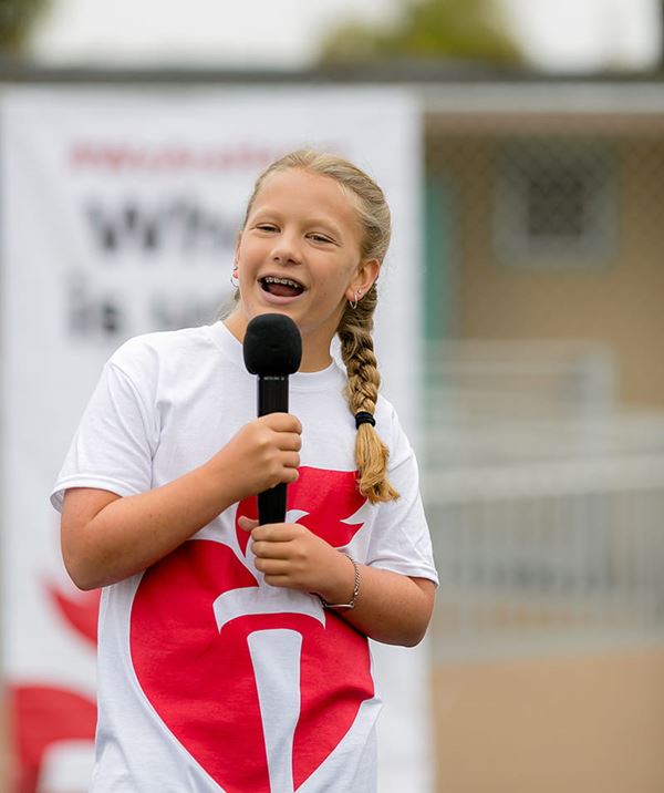 student with microphone